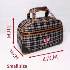 a plaid duffle bag is shown with measurements