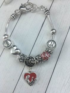 "Worn Silver Mom European Style Charm Bracelet 7.5\" + 1\"" Red Beaded Bracelets For Mother's Day, Silver Stretch Bracelet Gift For Mother's Day, Silver Stretch Bracelet For Mother's Day, Red Bracelets For Mother's Day, Nickel-free Beaded Bracelets For Mother's Day, Personalized Stretch Bracelet For Mother's Day, Coastal Earrings, Mothers Day Jewelry, Anchor Jewelry