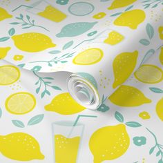 a yellow and blue wallpaper with lemons on it