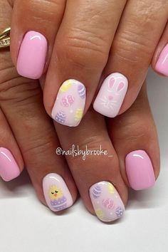 Get in the Easter mood with these adorable pastel pink squoval nails! 🌸🐣 Click through to see the charming chick, bunny, and multicolor Easter egg accents. Perfect for springtime celebrations! // Photo Credit: Instagram @nailsbybrooke___ Gel Easter Nails Short, Easter Nail Designs Bunny, Cute Easter Nails Short, Easter Nail Inspiration, Easter Colors Nails, Easter Bunny Nail Art, Chick Nail Art