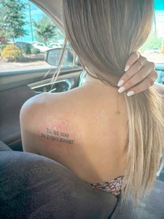 the back of a woman's neck with a tattoo saying i'll be you