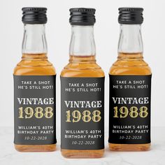 three bottles of whiskey are shown in front of a white background with the words, vintage birthday