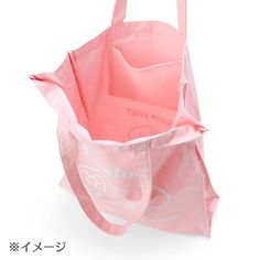 a pink shopping bag on a white background with japanese characters in the bottom right corner