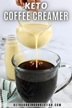 the keto coffee creamer is being poured into a cup with liquid in it