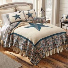 a bed room with a neatly made bedspread and star decorations on the comforter