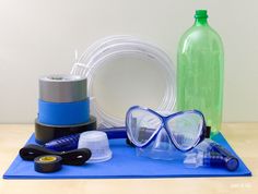 various items are laid out on a mat to be used as a gadget for eyeglasses