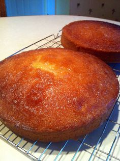 two cakes sitting on top of a cooling rack