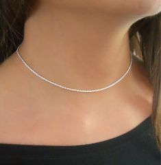 "Delicate Sterling Silver Rope Chain Choker Necklace, Minimalist Silver Necklace for Women Brighten up your day with this gorgeous choker! The perfect necklace to wear on its own or layer with other necklaces. It will be a great addition to your jewelry collection and it will pair well with both informal and formal outfits. ⊹ L e n g t h 13\" + 3\" extender ⊹ D e t a i l s Sterling silver ⊹ Read about my shop Processing and Delivery times, Payment options, Packaging and Care instructions here: h Minimalist Silver Necklace, Minimalist Necklace Silver, Delicate Silver Necklace, Sterling Silver Choker Necklace, Simple Choker, Choker Silver, Silver Rope Chain, Clean Sterling Silver, Sterling Silver Choker