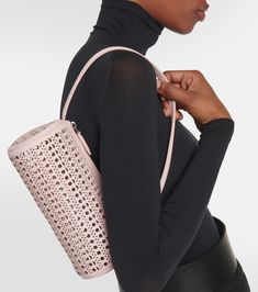 Find ALAÏA Alaïa Tube Perforated Leather Shoulder Bag on Editorialist. Material: leather. Made in Italy. Designer color name: Rose Dragee. Top handle. Internal details: leather lining. Closure: zipped top. Color: pink. Designer Leather Bags With Perforations, Elegant Leather Shoulder Bag With Perforations, Chic Leather Shoulder Bag With Perforations, Leather Shoulder Bag With Perforations, Perforated Leather, Leather Pattern, Pink Mini, Black Mini, White Bag