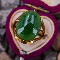 This fantastic hand fabricated ring features an oval cabochon cut nephrite jade with textured detail the prongs. The ring is crafted in 14k yellow gold with a great patina, and had a high carat gold wash at some point. This ring is currently a size 5.5. Nephrite Jade, Patina Finish, Gold Wash, Jade Ring, Vintage Bracelets, Oval Cabochon, Patina, Jade, Hand Made