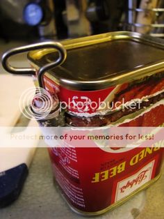 a can of canned food sitting on top of a counter