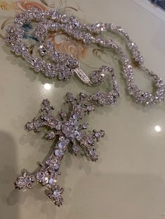 Elegant Cross-shaped Rhinestone Necklace For Parties, Elegant Cross Rhinestone Necklace For Parties, Cross-shaped Rhinestone Jewelry For Parties, Silver Crystal Cross Pendant Necklace, Cross Shaped Rhinestone Jewelry For Parties, Silver Cross Jewelry For Party, Silver Cross Pendant Jewelry For Party, Cross Shaped Rhinestone Party Jewelry, Elegant Silver Iced Out Rhinestone Necklace