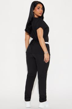 Available In Black/White And Charcoal. 2 Piece Scrub Set Short Sleeve Uniform Top V Neck Contrast Trim Detail Tie Back Waist Matching Pants Elastic Waistband Pockets Stretch 96% Polyester 4% Spandex Imported | Put In Work Contrast Trim Stretch Uniform Scrub Set in Black/White size Large by Fashion Nova Medical Scrubs Outfit, Scrubs Outfit, Scrubs Uniform, Black Scrubs, Medical Scrubs, Matching Pants, Black White Fashion, Trim Detail, Contrast Trim