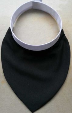 a black and white bib on a table