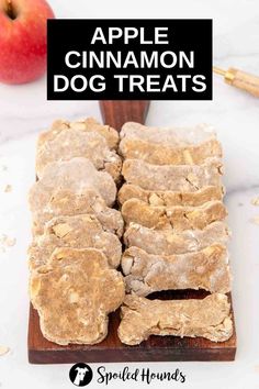 apple cinnamon dog treats on a cutting board with apples in the background and text overlay