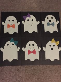 four pieces of paper cut out to look like ghostes with bow ties on them