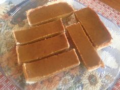 several pieces of bread sitting on top of a glass plate