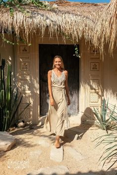 Desert Sage Fringe Maxi Boho Dress.Long Bamboo Dress is a divine artefact from our new collection. The silhouette is floaty and simple, with two slits on the sides – so that the dress looks very classy and elegant. Fringe decoration on the v-neck and amazing long belt with fringes adds original boho chic accent, that w Elegant Beige Boho Maxi Dress, Bohemian Floor-length Dress With Side Slits, Bohemian Split Party Dress, Bohemian Split Dress For Party, Beige Summer Dresses With Side Slits, Elegant Split Dresses For Summer, Beige Summer Dress With Side Slits, Elegant Floor-length Boho Dress For Vacation, Elegant Maxi Dress With Side Slits For Vacation