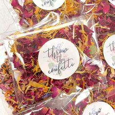 dried flowers in plastic bags with some saying on them