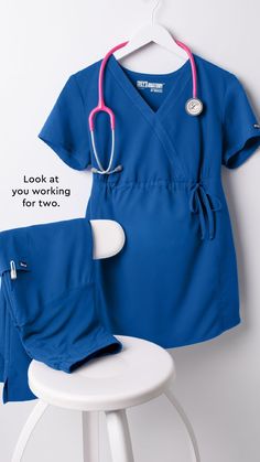 Royal blue maternity scrub top and maternity scrub pants from Grey's Anatomy with a pink Littmann stethoscope. Maternity Scrub Pants, Top Uniform, Caring For Others, Maternity Scrubs, Grey's Anatomy, Maternity Tops, Wrap Top