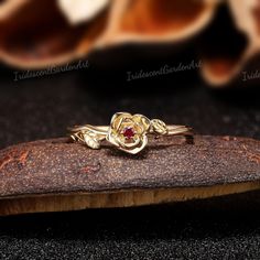 Vintage Ruby Engagement Ring Nature Inspired Rose Flower Leaf Ring Red Gem Ruby Jewelry July Birthstone Ring Gold Wedding Rings for Women RING DESCRIPTION ✦Engagement Ring ✴Center Stone - Natural Ruby Shape - Round Cut ✴Band Width - About 1.4mm ✴Ring Metal:  Available in rose gold plated, yellow gold plated, 925 sterling silver, 10k or 14k solid rose, yellow or white gold. MAKING & SHIPPING ✦PAYMENT PLAN ♡ We provide layaway plans which can be a weekly or monthly payment plan. ♡ Note:  - The fir Elegant Rose Red Rings For Valentine's Day, Fine Jewelry Flower Ring With Rose Design For Promise, Fine Jewelry Rose Design Flower Ring For Promise, Gold Ruby Flower Ring, Rose Design Flower Ring For Promise, Ruby Flower Ring For Anniversary, Flower-shaped Ruby Ring For Anniversary, Rose Red Rings For Wedding On Valentine's Day, Elegant Rose Red Rings For Anniversary