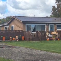 a house that has some fake giraffes on it