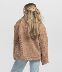 Crafted from faux fur sherpa fabric, this jacket envelops you in plush softness, making it perfect for chilly days and outdoor adventures. Maggie is 5’6” and is wearing a small Faux Fur Sherpa Jacket in Taupe.