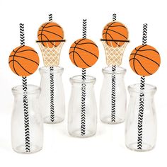 basketball themed drinking straws in glass vases