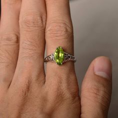 This is a gorgeous handmade creation. Its beauty is its simplicity & Elegance. The 6*12 mm marquise shape faceted natural Peridot is crafted in solid sterling silver and with rhodium plated. Main stone weight about 1.9 ct. All item is sent in a beautiful gift box If you have any idea of design your ring,pls contact me directly. You can realize more lovely stuff clicking the link https://www.etsy.com/shop/knightjewelry?refshopsection_shophome_leftnav Please leave the correct address and you p Classic Marquise Jewelry For May Birthstone, Classic Marquise May Birthstone Jewelry, Marquise Cut Crystal Gemstone Ring, Oval Peridot Jewelry With Accent Stones, Sterling Silver Marquise Birthstone Ring, Marquise Sterling Silver Birthstone Ring, Sterling Silver Marquise Gemstone Rings, Marquise Sterling Silver Birthstone Ring With Gemstone, Oval Peridot Solitaire Jewelry