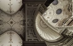 looking up at an ornate ceiling in a building