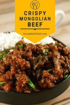 a bowl filled with meat and rice next to a yellow sign that says crispy mongolian beef