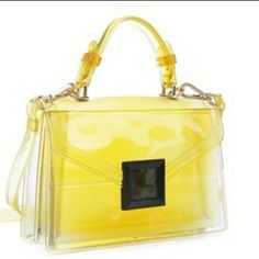 The Mini Candy Purse Nwt Features: Shoulder Bag; Cross-Body Bag; Petite Handbag; Semi-Opaque Coating; Structured Jelly Rubber Handbag; Single, Flat & Short Top Handle; Single, Long & Skinny Shoulder Strap; Front Framed Signature Push-Lock Secures The Fold-Over Top Flap Color: Yellow Only Fiber: High-Gloss Finish Pvc; Jelly Rubber Size: 8" X 9" X 2 1/2" My Home Is Pet & Smoke Free. Check Out My Entire Closet & Bundle For A Great Discount. I Consider All Reasonable Offers. Gold Flap Shoulder Bag With Top Carry Handle, Gold Shoulder Flap Bag With Top Carry Handle, Square Flap Bag With Gold-tone Hardware For Shopping, Luxury Gold Box Bag With Large Capacity, Luxury Large Capacity Gold Box Bag, Large Capacity Square Evening Flap Bag, Large Capacity Square Flap Bag For Evening, Gold Rectangular Flap Bag For Shopping, Chic Square Evening Bag With Large Capacity