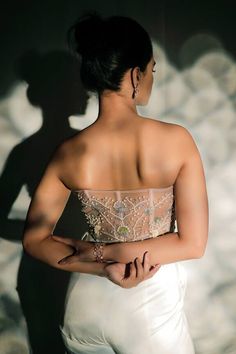 Beige tulle pearl and sequin floral embroidered padded corset top.
Components:1
Pattern:Embroidery
Type of Work:Pearls, Sequin
Neckline:Sweetheart
Sleeve Type:Sleeveless
Fabric:Tulle
Color:Beige
Other Details:
Attached lining
Weight approx : (in kg) : 0.9
Note: The stole/dupatta, pant and skirt worn by the model are not for sale
Occasion:Cocktail,Party - Aza Fashions Wedding Glamorous Corset With Sheer Bodice, Glamorous Wedding Corset With Sheer Bodice, Sleeveless Glamorous Wedding Corset, Glamorous Sleeveless Wedding Corset, Elegant Embellished Wedding Corset, Glamorous Wedding Corset With Fitted Bodice, Glamorous Wedding Corset With Sweetheart Neckline, Sheer Organza Bodice For Wedding, Sleeveless Sheer Bodice For Wedding