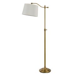 a floor lamp with a white shade on the base and a gold colored metal pole