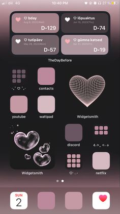 an iphone screen with different colors and shapes on the phone's display, including two hearts