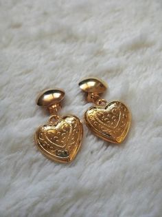 Deadstock vintage gold heart earrings 90s gold heart drop earrings heart clip on earrings. by MaletaVintageClothes Gold Heart Shaped Clip-on Earrings For Wedding, Vintage Dangle Clip-on Earrings For Gift, Gold Heart-shaped Clip-on Earrings For Anniversary, Gold Heart-shaped Clip-on Earrings For Wedding, Gold Clip-on Heart Earrings For Anniversary, Gold Clip-on Heart Earrings For Valentine's Day, Vintage Heart Charm Earrings For Anniversary, Vintage Heart Earrings For Anniversary, Gold Clip-on Earrings For Valentine's Day Gift