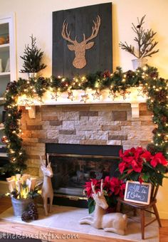 a fireplace decorated for christmas with deer and poinsettis