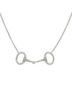 This classic snaffle bit necklace is the perfect accessory for any horse enthusiast. Crafted from a high-quality metal, this piece offers a timeless and sophisticated look that's sure to complete any outfit. With its classic shape and unique design, this necklace will make a great addition to any wardrobe. Rhodium-plated Rhinestone Approx. 18 in Imported 1.6 oz window.adminAccountId=232260164;