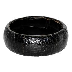 Product Description: Dress up any arm any day with this chunky black alligator skin leather bangle. Wear it alone or add more for a layered look. Dimensions: 1"x 2 1/2" Black Alligator, Alligator Skin, Leather Bangle, Black Vintage, Colorful Bracelets, Layered Look, Dark Colors, Wear It, Bangle Bracelet