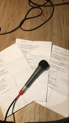 a microphone and some papers on a table