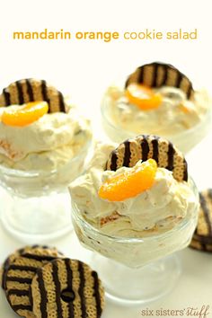 four desserts in small glass dishes on a table