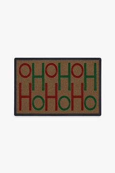 a door mat with the words ho ho hoo on it in red and green