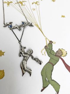 "Little Prince Necklace, Le Petit Prince Pendant Sterling Silver 925, Little Prince with Birds, Handmade Jewelry, Gift for Her Pendant height 8 cm / 3,15 inches Wight - 5 cm / 1,97 inches Weight of pendant - 11 gram \"All the adults were children at first, only few of them remember this.\" Antoine de Saint-Exupéry \"The Little Prince\"   The \"Little Prince\" pendant is a product with meaning, based on the famous work of Antoine de Saint-Exupéry. The pendant is made of 925 sterling silver with b The Little Prince Jewelry, Little Prince, The Little Prince, Handmade Jewelry Gift, Disney Outfits, Cute Disney, Hama Beads, Polymer Clay Crafts, Remember This