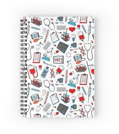 a spiral notebook with medical icons on it