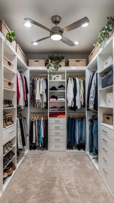 a walk in closet filled with lots of clothes