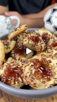 a bowl filled with cookies covered in toppings