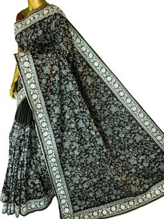 The new and latest style as your party drapes are woven in a unique manner with an amazing gachi tussar saree in vibrant black color with mavhine embroidery work on the body and the border comes with Kashmiri stitch done by adorably. Color: A shade of black color Technique: Work of machine embroidery on the whole body with Kashmiri stitch work on the border Fabric: Tussar Quality: IndyVogue's Assurance of Silk Mark Certification Tussar Saree, Border Fabric, Stitch Work, On The Border, Color Techniques, Kinds Of Fabric, Latest Sarees, Whole Body, Embroidery Work