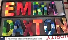 the letters are made up of different colors and sizes, including one that says'emana daxton '