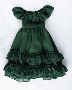 Elegant hunter green long ruffle maxi dress with beautiful ruffle cross back by Bailey's Blossoms. Available in sizes for babies and toddlers 6-9M to 5T. Hunter Dress, Santa Outfit, Ruffle Maxi Dress, Flowy Fabric, Ruffled Maxi Dress, Just Amazing, Christmas Dress, Toddler Dress, Hunter Green