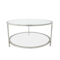 a round glass table with metal legs